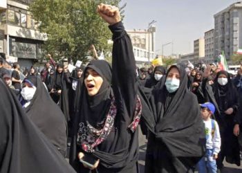 Iran bans film festival over poster of actress without hijab