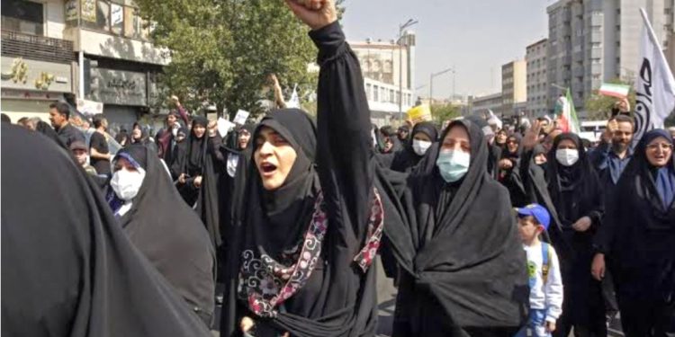 Iran bans film festival over poster of actress without hijab
