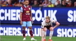 Man City suffers injury, wins league opener at Burnley