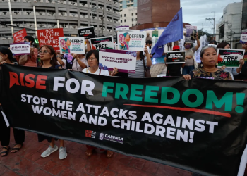 Members of women's rights groups hold signs supporting Palestine during a rally in Quezon City, Metro Manila, the Philippines. [Rolex Dela Pena/EPA]