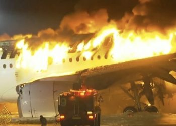 Japan airlines plane in flames after collision