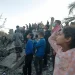 Palestinians search for bodies and survivors after Israeli air strikes in southern Gaza on Tuesday