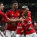Manchester United edge Liverpool 4-3, keeping trophy hopes alive