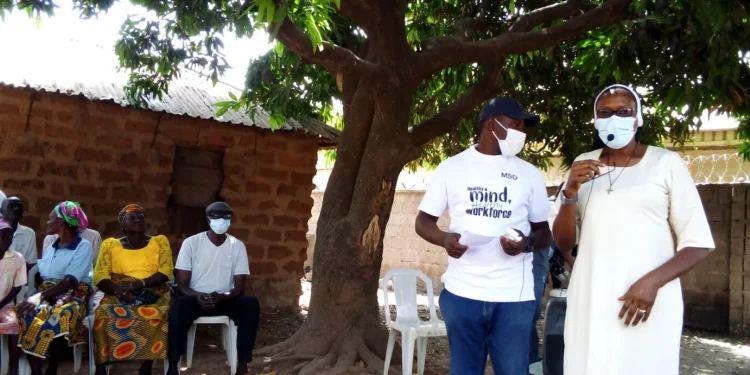 NGO conducts medical outreach screening individuals for tuberculosis treatment