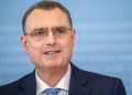 Swiss Central Bank cuts interest rate by 0.25%