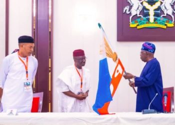 Okpebholo: ‘I’m with you,’ Tinubu pledges support, hands APC flag to Edo Governorship candidate (photos)