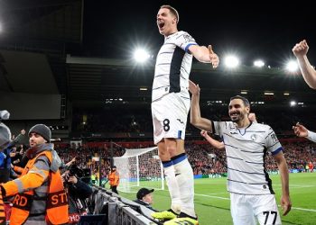 Atalanta’s Croatian midfielder #08 Mario Pasalic (C) celebrates scoring the team’s third goal during the UEFA Europa League quarter-final first leg football match