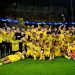 Borussia Dortmund celebrating their victory over PSG in the UEFA Champions League
