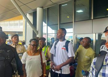 Israel Adesanya arrives Lagos with parents