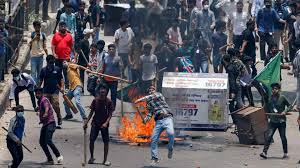 Bangladesh PM flees as protesters defy curfew