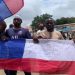 Protesters waving Russian flags committing treason – Defence chief