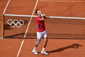 Novak Djokovic completes tennis haul after beating Carlos Alcaraz to win Olympic gold