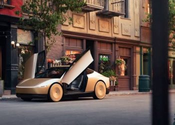Musk unveils self-driving, robotic taxi