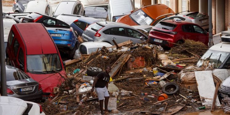 Flash floods kill dozens, submerge town in Spain