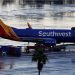 Gunfire strikes Southwest plane on tarmac at Dallas airport
