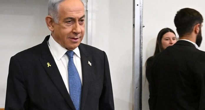 Israeli Prime Minister Benjamin Netanyahu attends the fifth day of testimony in his trial on corruption charges at the district court in Tel Aviv on December 23, 2024