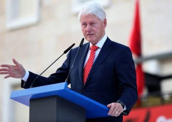 Former US president Bill Clinton delivers a speech in front of government headquarters in Tirana on July 3, 2023, during a ceremony held in his honour as part of his first official visit to Albania.