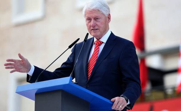 Former US president Bill Clinton delivers a speech in front of government headquarters in Tirana on July 3, 2023, during a ceremony held in his honour as part of his first official visit to Albania.