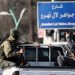 Fighters of the ruling Syrian body patrol, in Damascus
