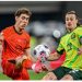 Australia beats China 2-0 to edge closer to World Cup
