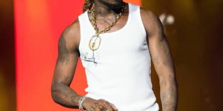 Asake cares for his father despite fame