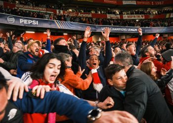 Arsenal fans celebrating their win over Real Madrid during the Champions League match at the Emirates Stadium. [PHOTO CREDIT: Official X account of Arsenal FC | @Arsenal]