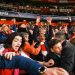 Arsenal fans celebrating their win over Real Madrid during the Champions League match at the Emirates Stadium. [PHOTO CREDIT: Official X account of Arsenal FC | @Arsenal]