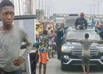 Alabi Quadri in front of Peter Obi's car in Lagos