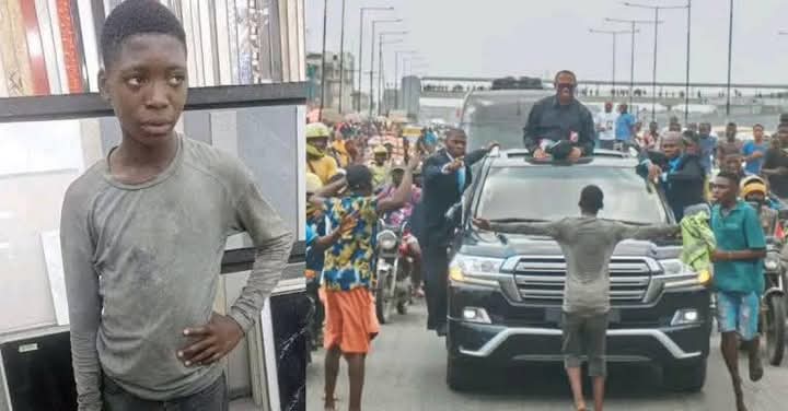 Alabi Quadri in front of Peter Obi's car in Lagos