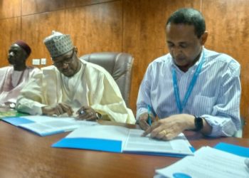 UNICEF Health Manager, Dr. Sereke Seyoum-Deres and Katsina Governor, Dikko Radda during the signing. [PHOTO CREDIT: NAN]