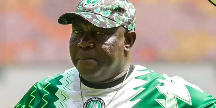Head Coach Justine Madugu