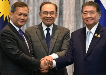 Malaysia's Prime Minister Anwar Ibrahim (C), Cambodia's Prime Minister Hun Manet (L) and Thailand's acting Prime Minister Phumtham Wechayachai (R)