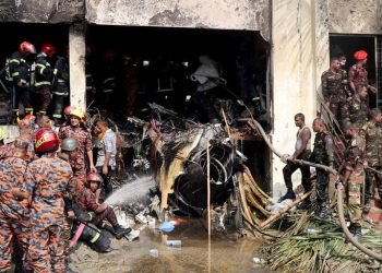 At least 19 die as Bangladesh air force plane crashes into college campus