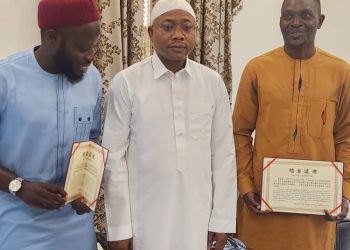 Kogi State Governor, Ahmed Usman Ododo receiving the first batch of returning participants
