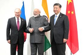 Xi Jinping standing alongside key partners, Russian President Vladimir Putin and Indian Prime Minister Narendra Modi