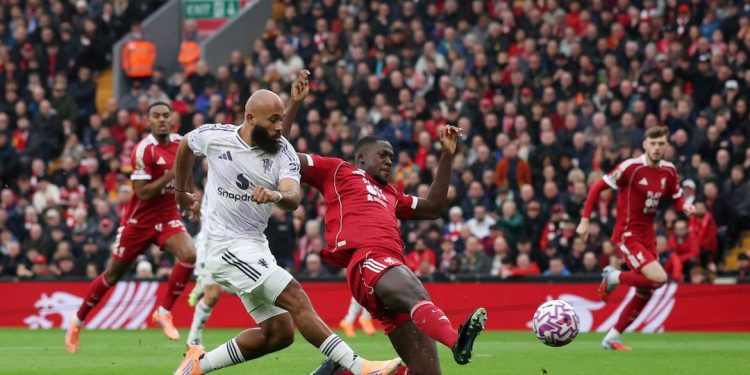Maguire’s late header sinks Liverpool at Anfield