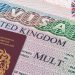 UK cuts post-study work period for foreign students