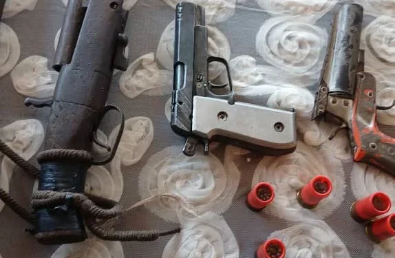 Police arrest two robbery suspects, seize bus and guns