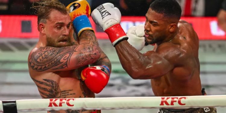 Joshua stops Paul in sixth round with jawbreaker