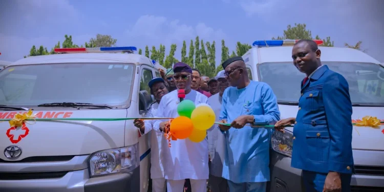 Aiyedatiwa commissioning the ambulances and other vehicles at government house in Akure