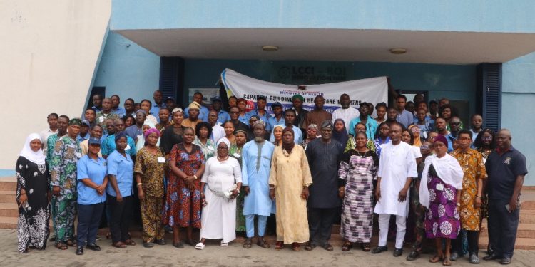 Facilitator and participants after an event in Lagos