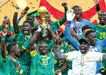 Senegal players celebrating after beating Morocco 1-0 to win the Africa Cup of Nations final match at the Prince Moulay Abdellah Stadium, Rabat