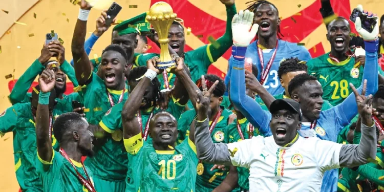 Senegal players celebrating after beating Morocco 1-0 to win the Africa Cup of Nations final match at the Prince Moulay Abdellah Stadium, Rabat