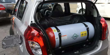 A car displaying a gas bottle to convert it to gas combustion in City Mechanic, a Compressed Natural Gas, CNG, center Lagos.