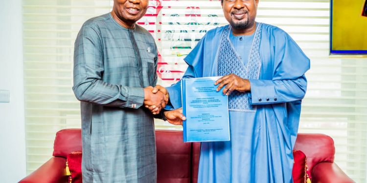 Chairman of the Nigeria Police Force committee on State Police, Professor Olu Ogunsakin, presents on behalf of IGP, Olatunji Rilwan Disu, a framework for the establishment of State Police to the Deputy President of the Senate, Senator Barau I Jibrin, at the National Assembly, Abuja, on Thursday