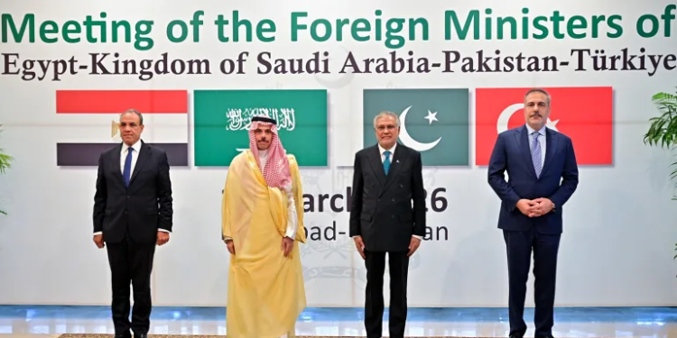 Pakistan's Foreign Minister Ishaq Dar (second right) poses for a photograph with his counterparts Turkey's Hakan Fidan (right), Saudi Arabia's Faisal bin Farhan (second left) and Egypt's Badr Abdelatty before their meeting at the Foreign Ministry office in Islamabad [Handout/Pakistan's Ministry of Foreign Affairs