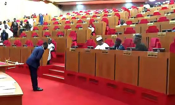 Taiwo Oyedele taking a bow before Senators after his screening as a ministerial nominee