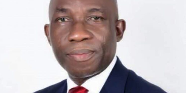 The Director-General, Dr John Asien