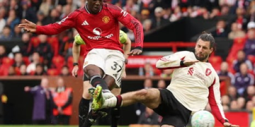 obbie Mainoo evades the challenge of Dominik Szoboszlai to score the winner for Manchester United.