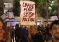 Israeli left-wing activists demonstrate against the Israeli government outside the Prime Minister’s residence in Jerusalem on Sunday